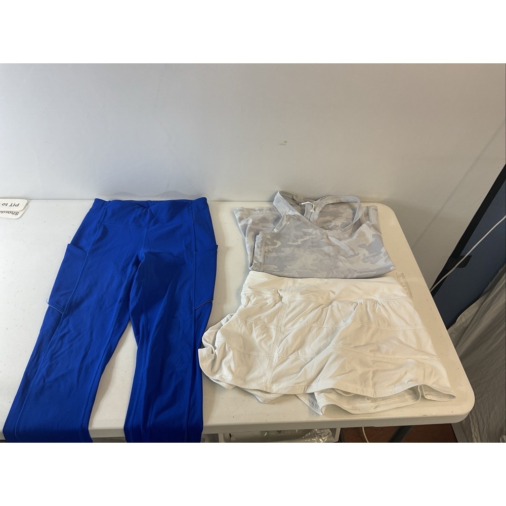 lululemon size 4 LOT 3Pieces Camo Tank, white skort, blue leggings high rise